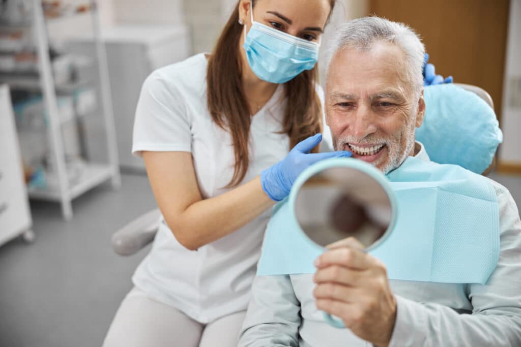 Dentist discussing treatment with a patient